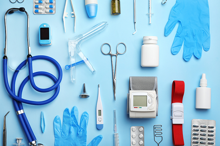 Flat lay composition with medical objects on color background